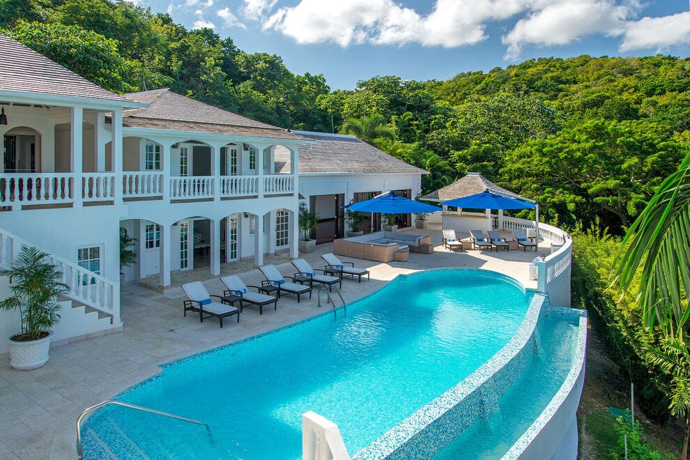 With commanding views of the forested hills, Villa Amana at The Tryall Club in Montego Bay is a palatial villa