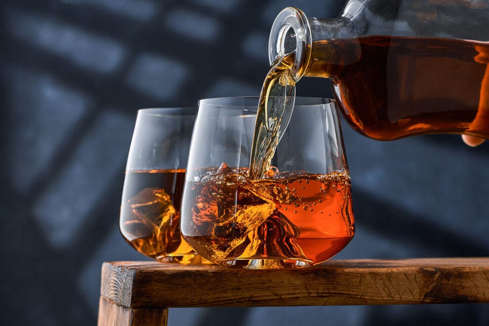 Whiskey being poured into a glass