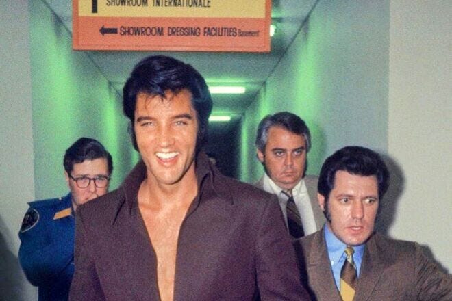 Elvis makes his way backstage at the former International Hotel
