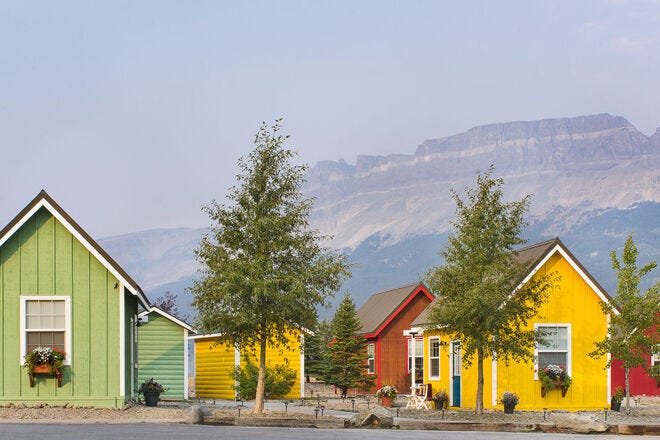 The homes are tiny but the backdrop looms large at St. Mary Village