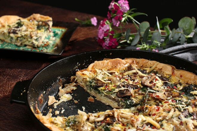 You can cook a mushroom and spinach quiche on a Big Green Egg