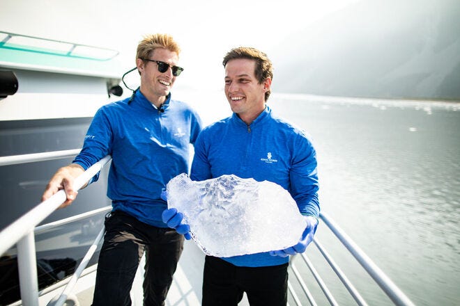 Holding a block of glacier ice for cocktails