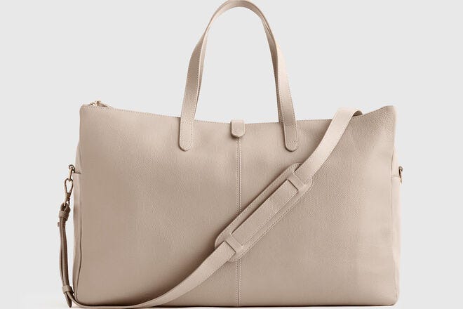 The Quince Italian Leather Triple Compartment Weekender is sleek and practical